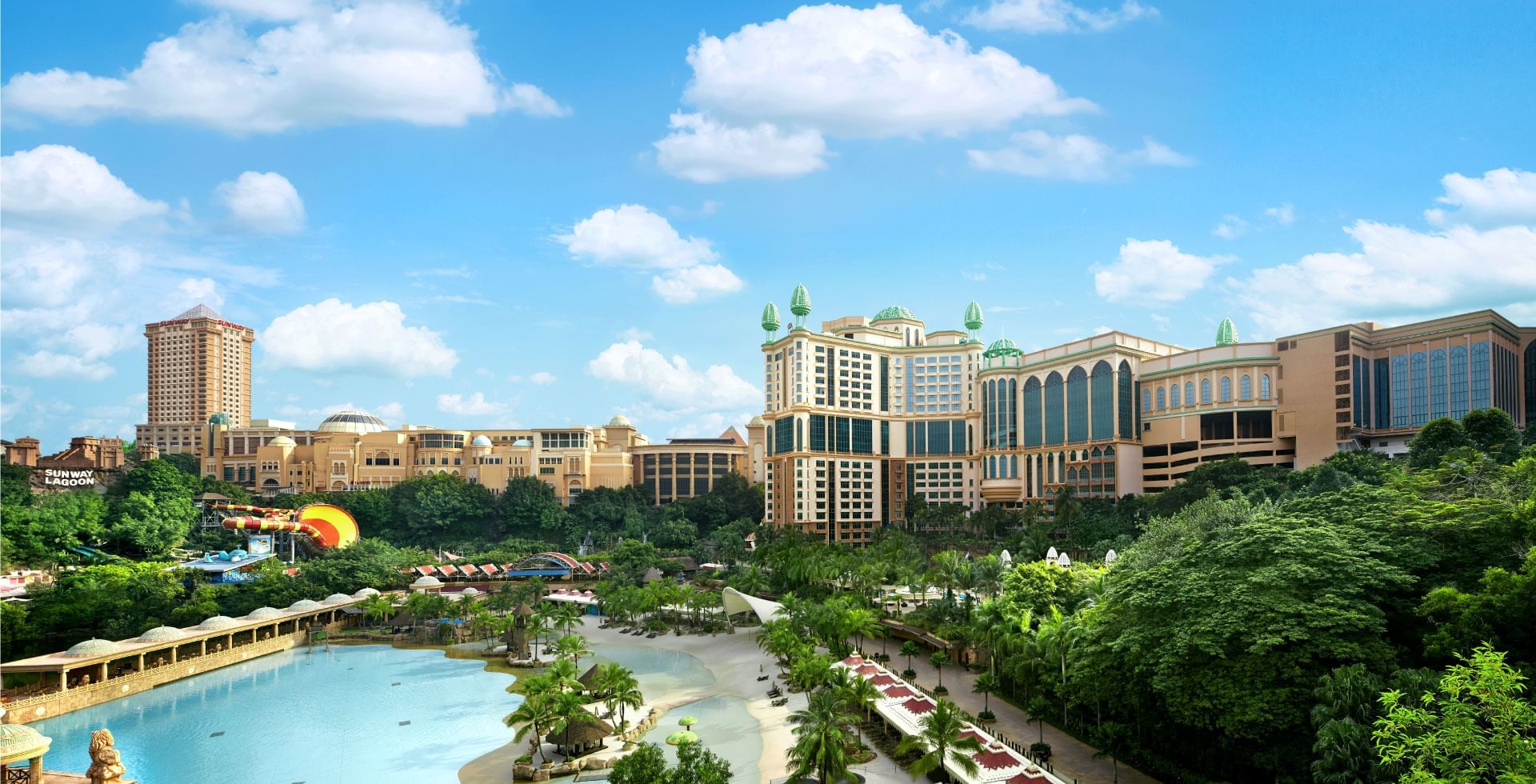 Expansive view of Sunway Resort and its surrounding theme park under a bright blue sky