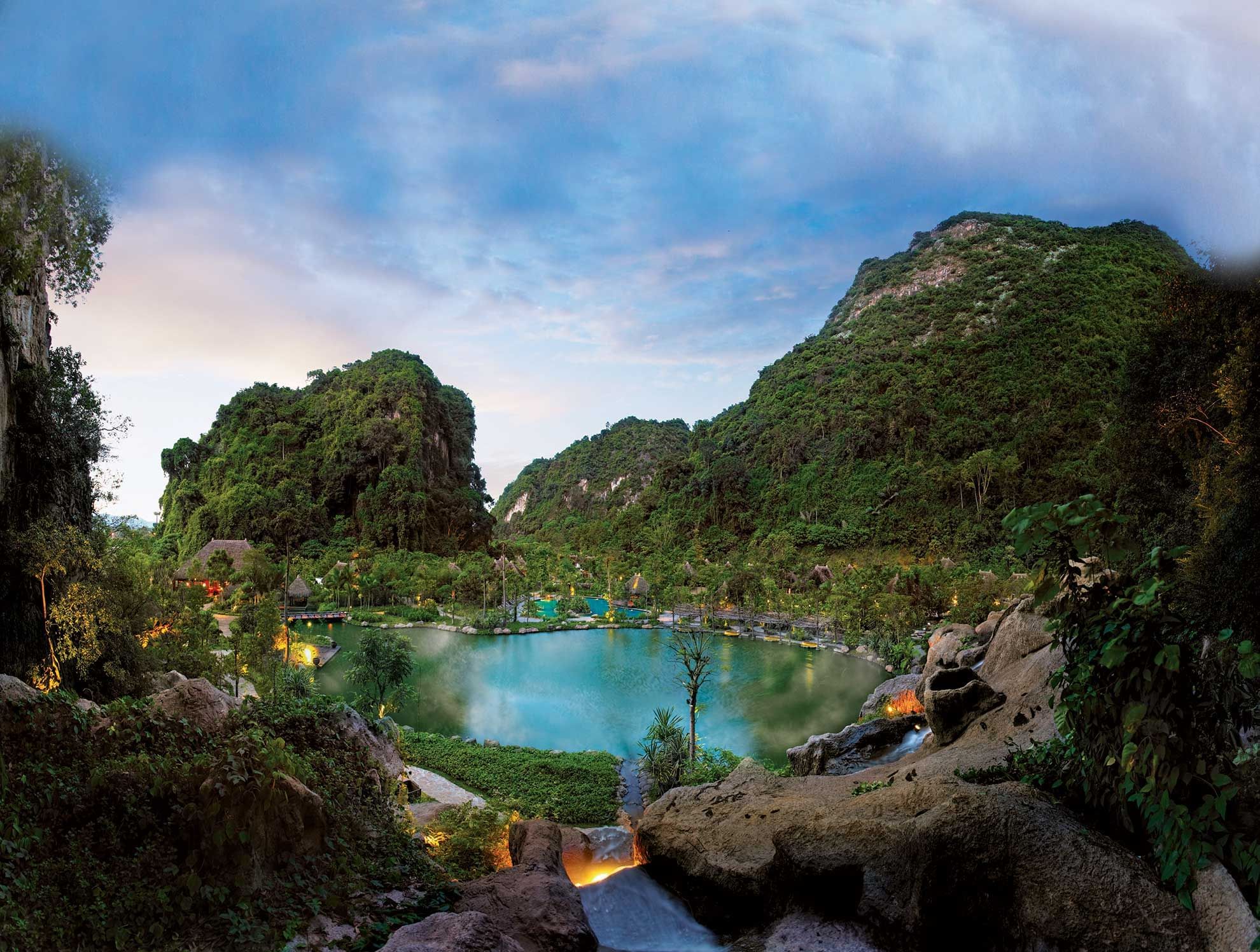 Distant view of the pool surround by trees in The Banjaran Hotsprings Retreat