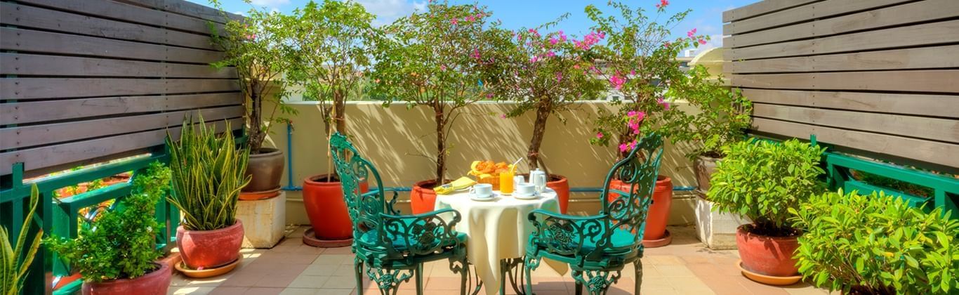Balcony with garden and Wat Phnom view at Sunway Hotel Phnom Pen