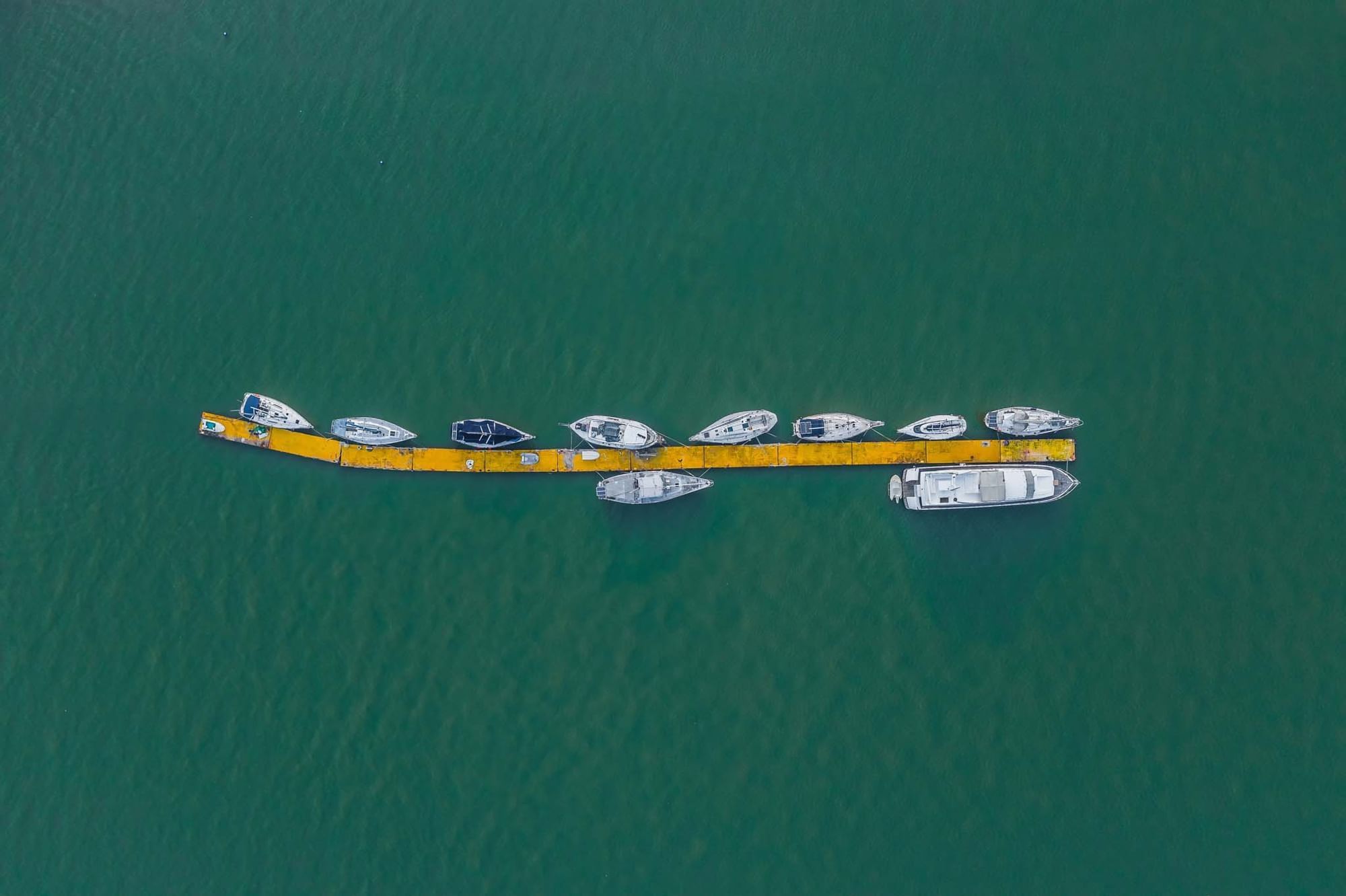 Aerial view of boats docked in the sea near Sunway Hotel Phnom Penh