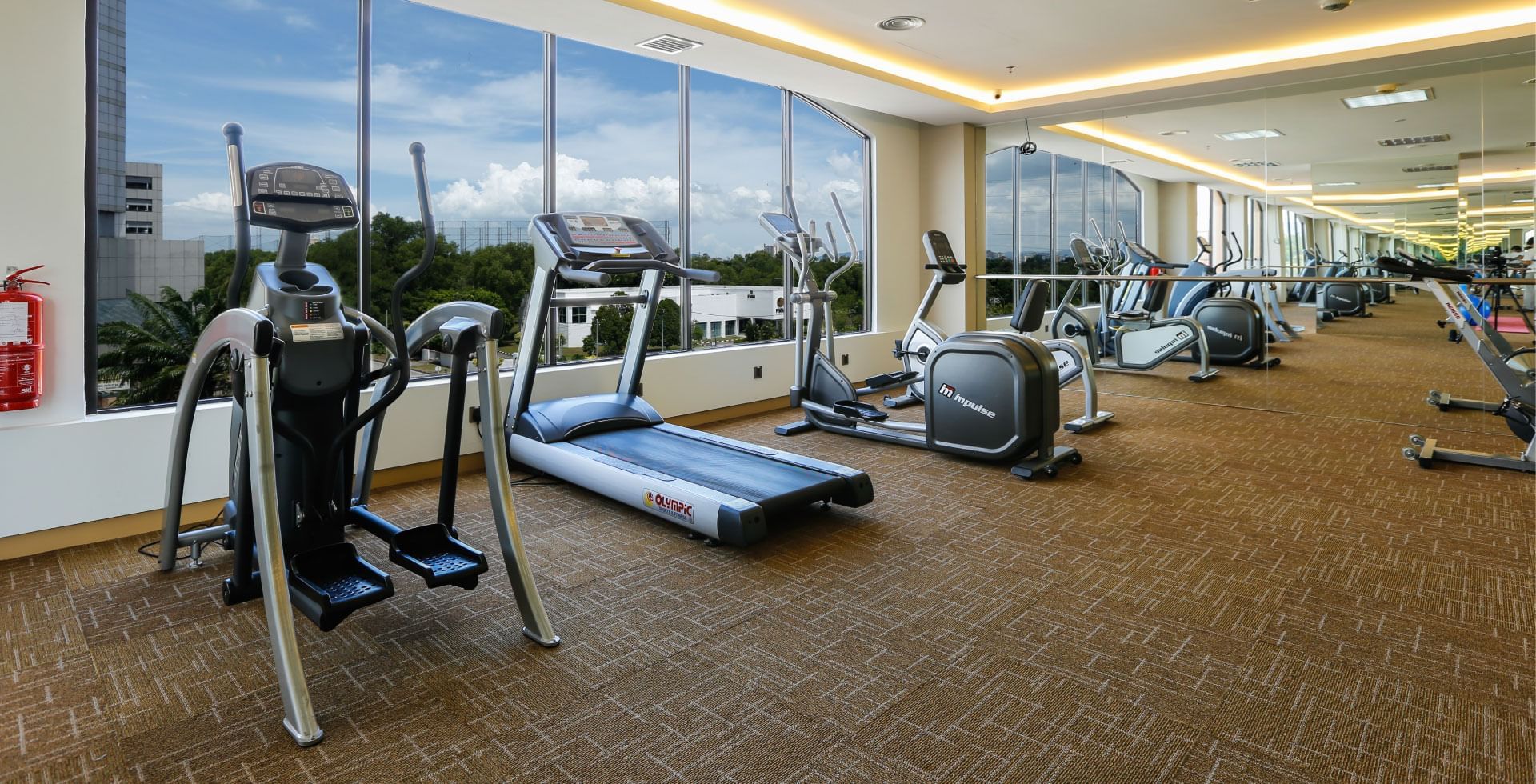 Exercise equipment lined in the Fitness Centre at Sunway Hotel Seberang Jaya