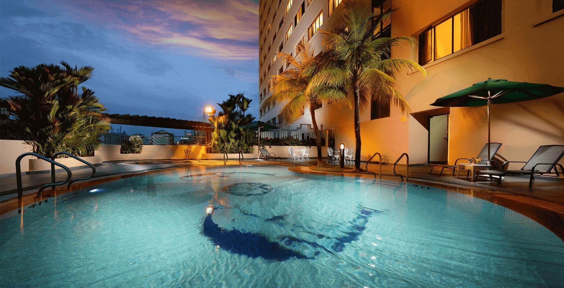 Exterior of the outdoor swimming pool & hotel at Sunway Hotel Georgetown