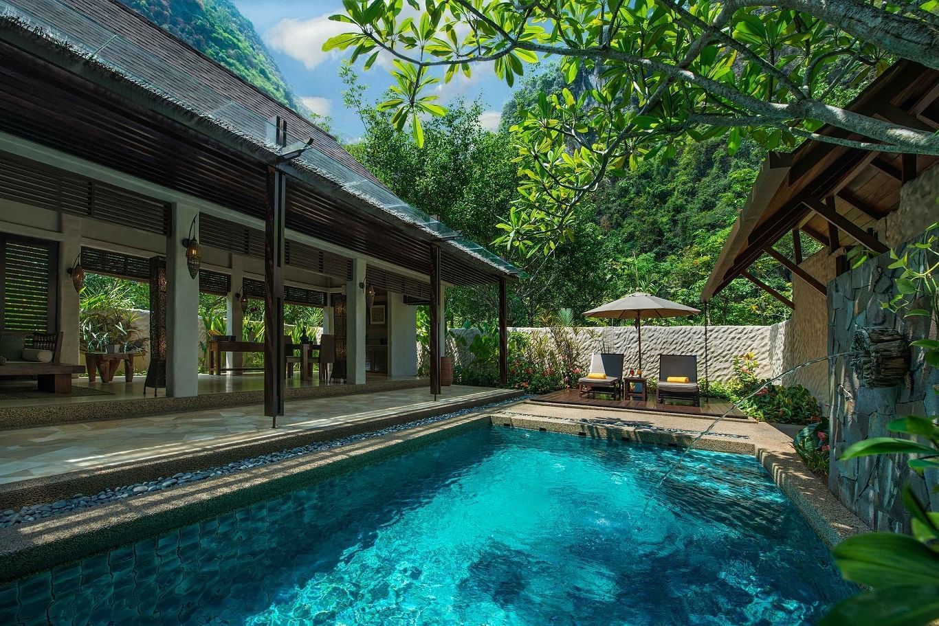 Sunbeds by the private pool area in Garden Villa at The Banjaran Hotsprings Retreat
