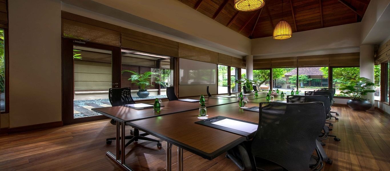 Conference table arranged in a Meeting Room at The Banjaran Hotsprings Retreat
