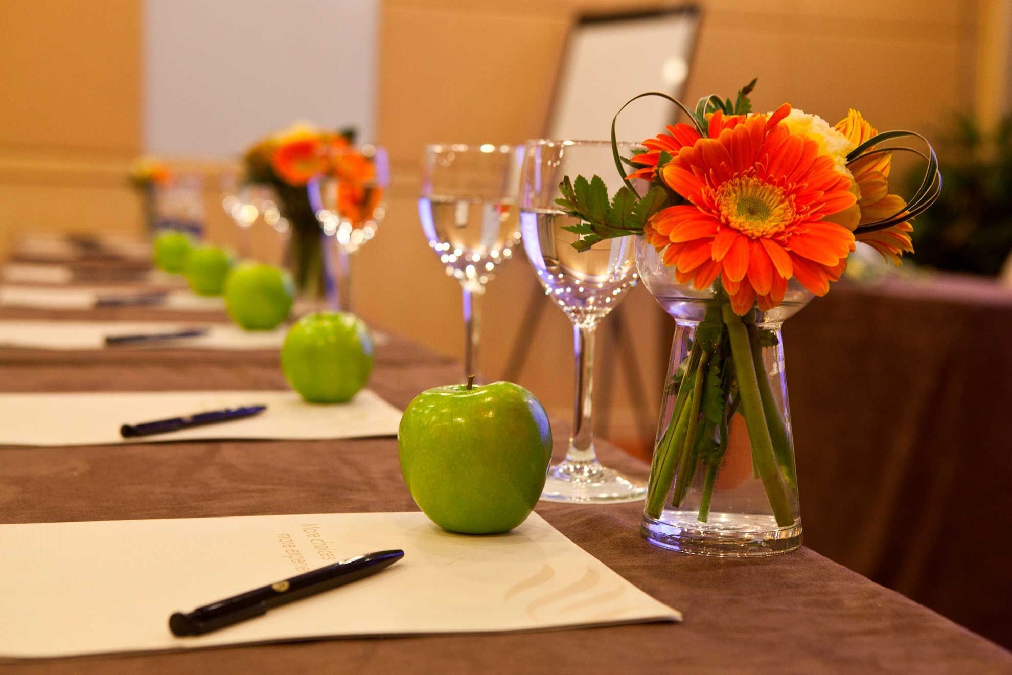 Close-up of meeting amenities on a table in the Conference Room at Sunway Hotel Hanoi