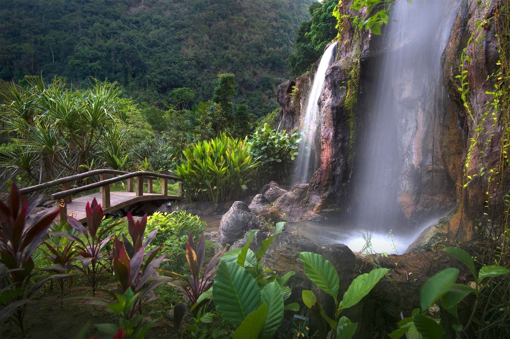 Landscape view of The Banjaran Hotsprings Retreat & a mini waterfall