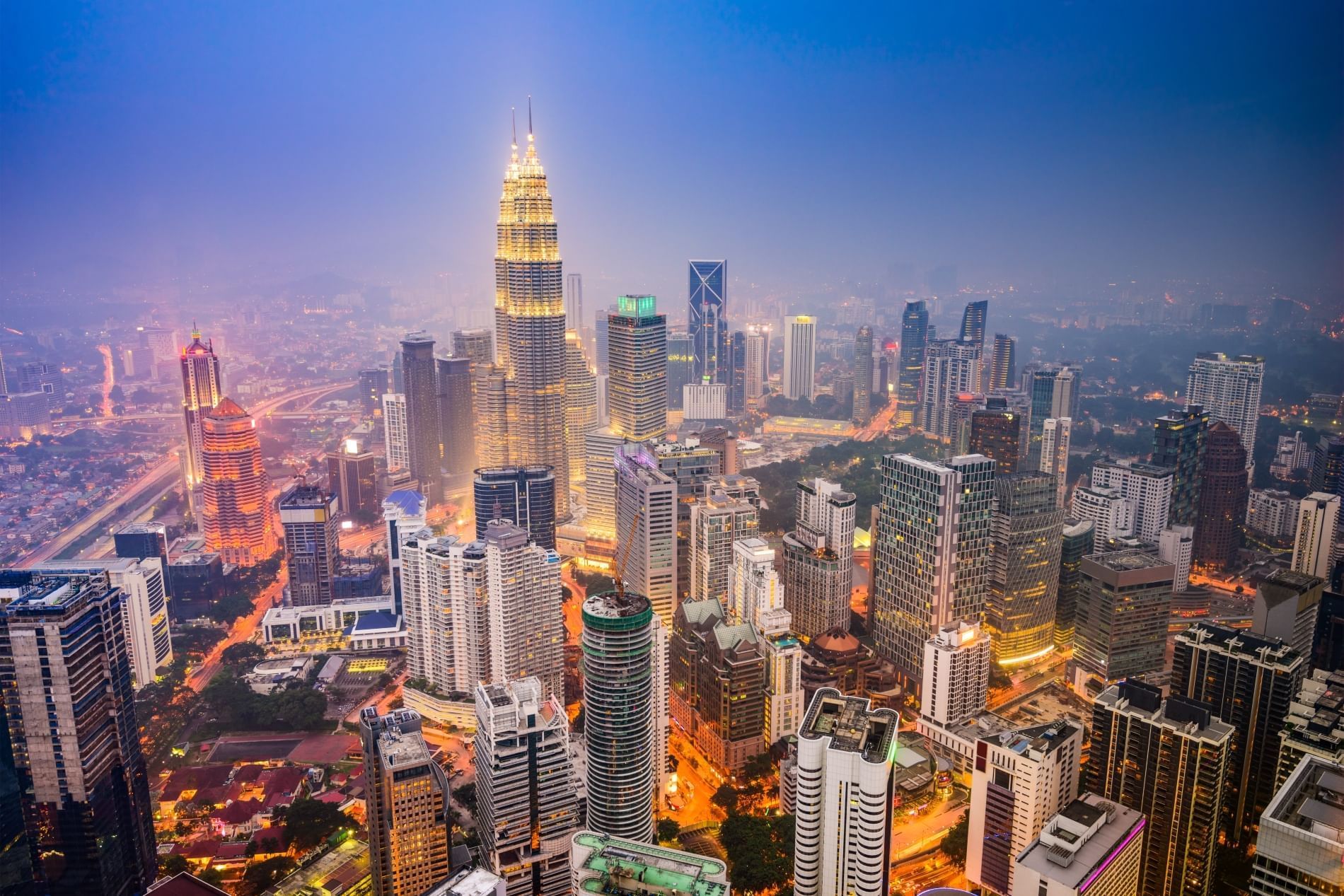 Night aerial view of Kuala Lumpur with bright lights at Sunway Velocity Hotel