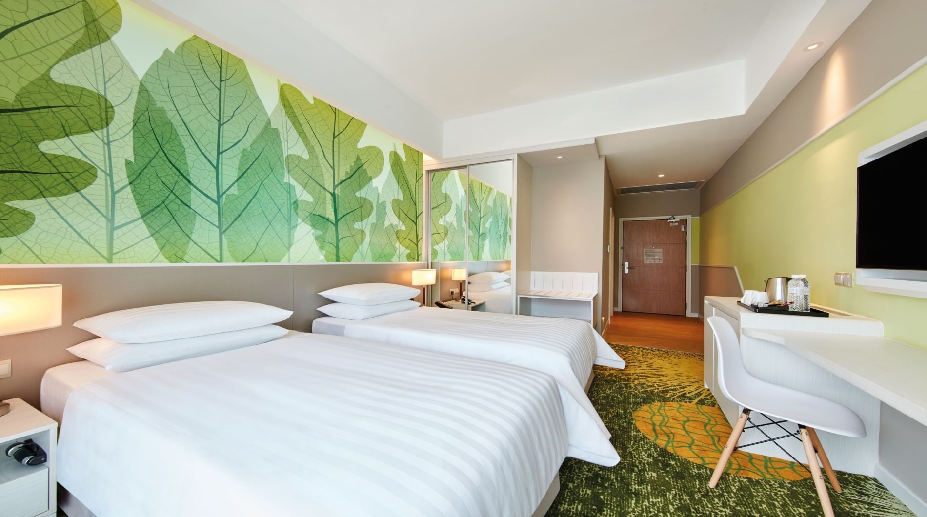 2 Comfy beds and a working table in Superior Twin Room at Sunway Velocity Hotel