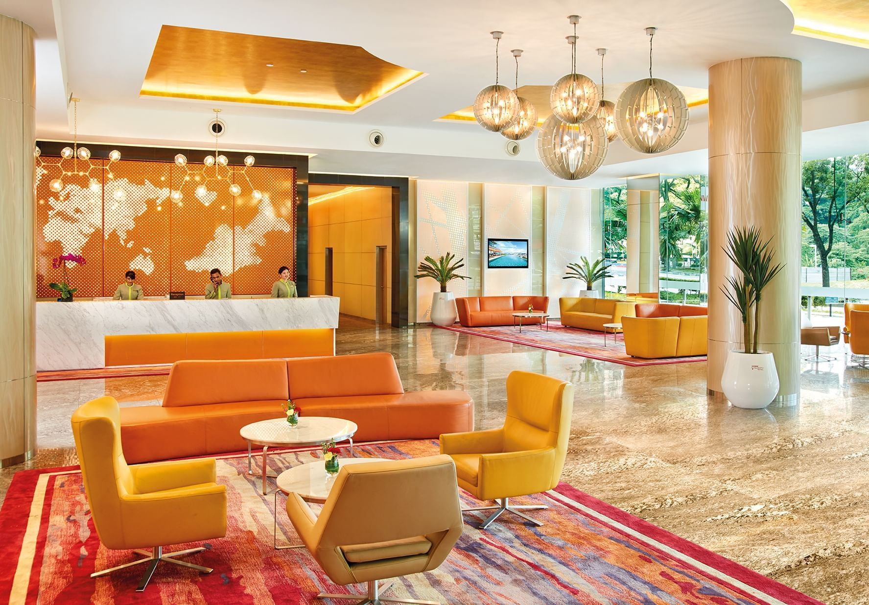 Lobby area with front desk with receptionists at Sunway Velocity Hotel