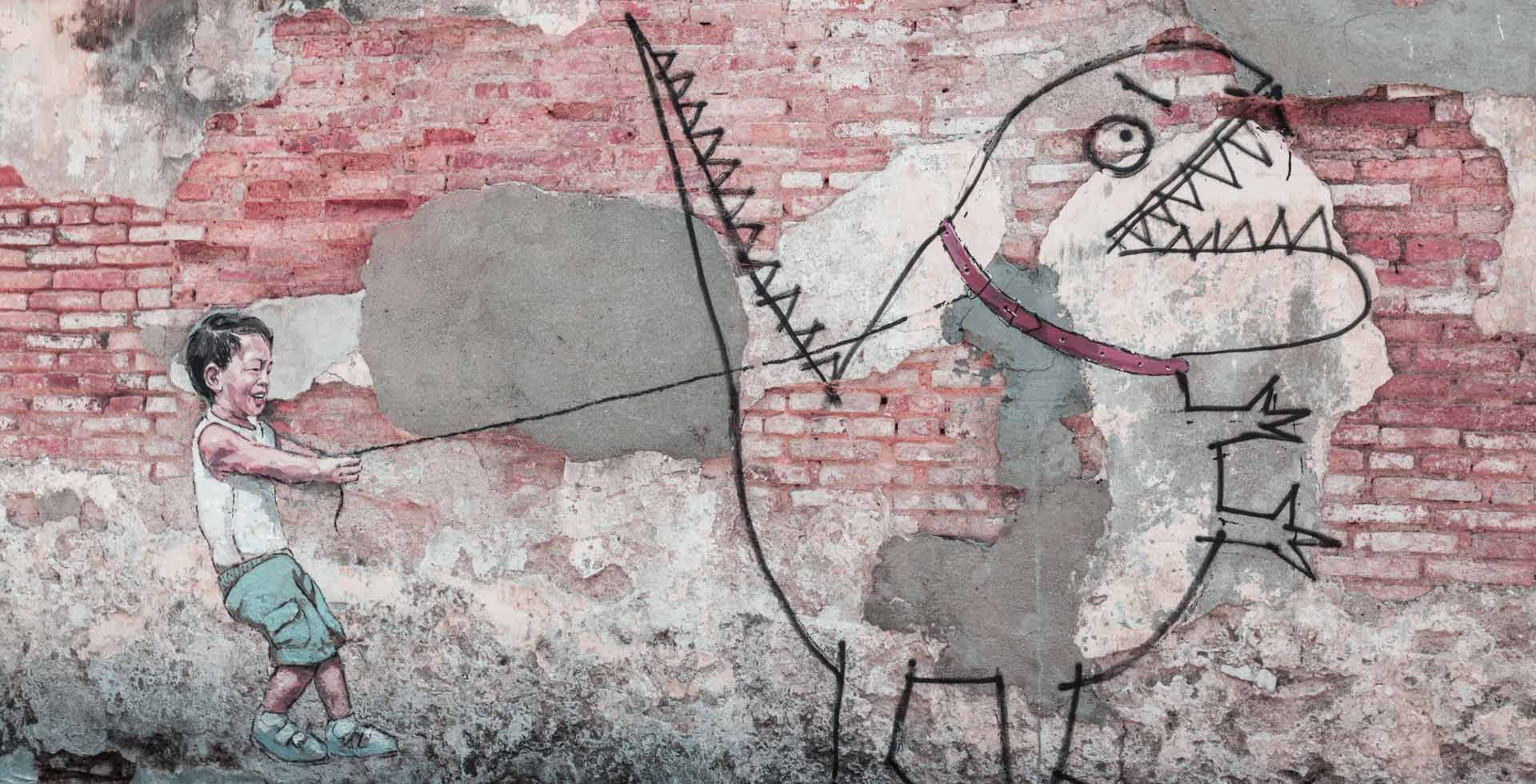 Kid with Dinosaur Street Art Wall Mural near Sunway Hotel Georgetown