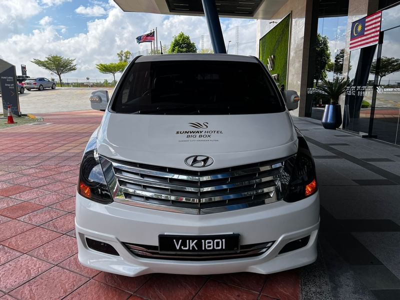 Luxury Hyundai ix35 Cab parked in front of the Sunway Hotel Big Box