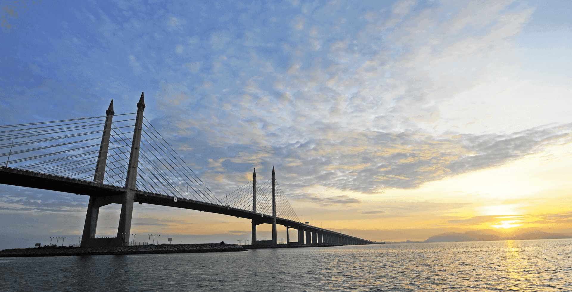 Distant view of Penang Bridge at sunrise near Sunway Hotel Seberang Jaya